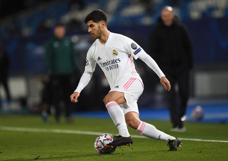 MADRID, SPAIN - DECEMBER 09:   Marco Asensio of Real Madrid looks on during the UEFA Champions League Group B stage match between Real Madrid and Borussia Moenchengladbach at Estadio Alfredo di Stefano on December 09, 2020 in Madrid, Spain. Sporting stadiums around Spain remain under strict restrictions due to the Coronavirus Pandemic as Government social distancing laws prohibit fans inside venues resulting in games being played behind closed doors. (Photo by Denis Doyle/Getty Images)