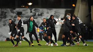 MADRID, SPAIN - DECEMBER 09: Alassane Plea of Borussia Moenchengladbach and teammates celebrate on the pitch at full-time after finding out they have qualified for the UEFA Champions League last 16 after the UEFA Champions League Group B stage match between Real Madrid and Borussia Moenchengladbach at Estadio Alfredo di Stefano on December 09, 2020 in Madrid, Spain. Sporting stadiums around Spain remain under strict restrictions due to the Coronavirus Pandemic as Government social distancing laws prohibit fans inside venues resulting in games being played behind closed doors. (Photo by Denis Doyle/Getty Images)