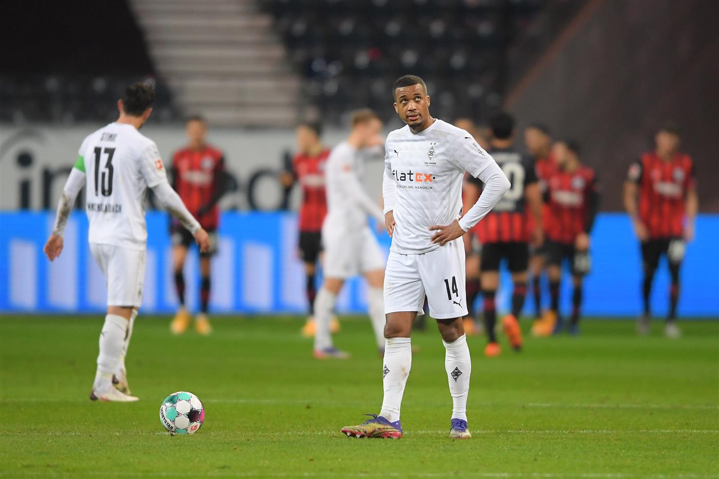 FRANKFURT AM MAIN, GERMANY - DECEMBER 15: Alassane Plea of Borussia Moenchengladbach looks dejected after conceding a third goal during the Bundesliga match between Eintracht Frankfurt and Borussia Moenchengladbach at Deutsche Bank Park on December 15, 2020 in Frankfurt am Main, Germany. Sporting stadiums around Germany remain under strict restrictions due to the Coronavirus Pandemic as Government social distancing laws prohibit fans inside venues resulting in games being played behind closed doors. (Photo by Alexander Scheuber/Getty Images)