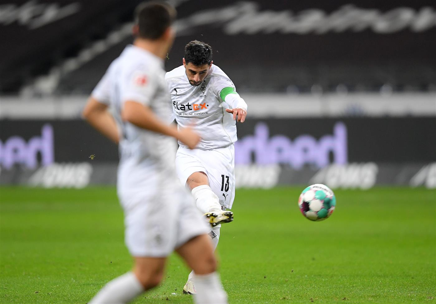 FRANKFURT AM MAIN, GERMANY - DECEMBER 15: Lars Stindl of Borussia Monchengladbach scores his sides first goal from a free kick during the Bundesliga match between Eintracht Frankfurt and Borussia Moenchengladbach at Deutsche Bank Park on December 15, 2020 in Frankfurt am Main, Germany. Sporting stadiums around Germany remain under strict restrictions due to the Coronavirus Pandemic as Government social distancing laws prohibit fans inside venues resulting in games being played behind closed doors. (Photo by Alexander Scheuber/Getty Images)