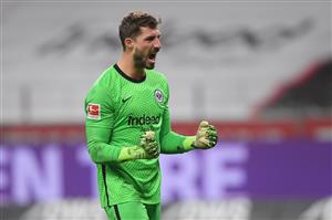 FRANKFURT AM MAIN, GERMANY - DECEMBER 15: Kevin Trapp of Eintracht Frankfurt celebrates their sides first goal during the Bundesliga match between Eintracht Frankfurt and Borussia Moenchengladbach at Deutsche Bank Park on December 15, 2020 in Frankfurt am Main, Germany. Sporting stadiums around Germany remain under strict restrictions due to the Coronavirus Pandemic as Government social distancing laws prohibit fans inside venues resulting in games being played behind closed doors. (Photo by Alexander Scheuber/Getty Images)