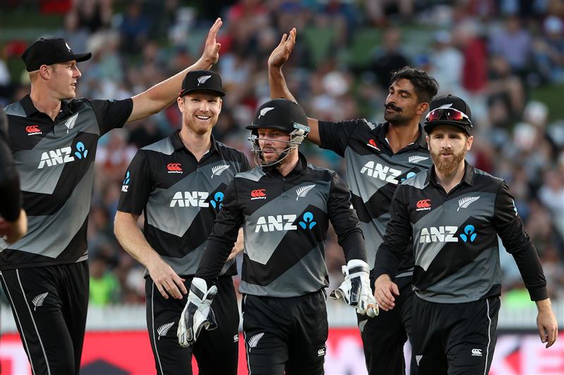 HAMILTON, NEW ZEALAND - DECEMBER 20: The Black Caps celebrate a wicket during the game two of the International T20 series between New Zealand and Pakistan at Seddon Park on December 20, 2020 in Hamilton, New Zealand. (Photo by Fiona Goodall/Getty Images)