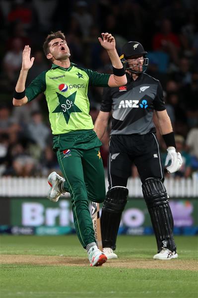 HAMILTON, NEW ZEALAND - DECEMBER 20: Shaheen Afridi of Pakistan reacts as he bowls during the game two of the International T20 series between New Zealand and Pakistan at Seddon Park on December 20, 2020 in Hamilton, New Zealand. (Photo by Fiona Goodall/Getty Images)