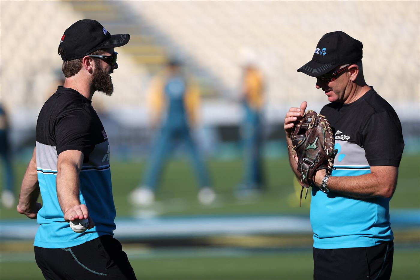 HAMILTON, NEW ZEALAND - DECEMBER 20: Kane Williamson, captain of New Zealand (L) and Black Caps coach Gary Stead warm up during game two of the International T20 series between New Zealand and Pakistan at Seddon Park on December 20, 2020 in Hamilton, New Zealand. (Photo by Fiona Goodall/Getty Images)