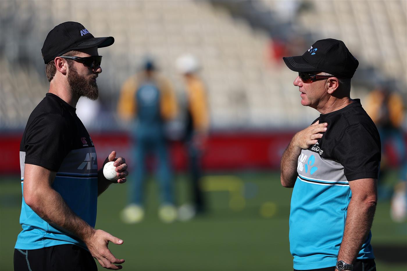 HAMILTON, NEW ZEALAND - DECEMBER 20: Kane Williamson, captain of New Zealand (L) and Black Caps coach Gary Stead warm up during game two of the International T20 series between New Zealand and Pakistan at Seddon Park on December 20, 2020 in Hamilton, New Zealand. (Photo by Fiona Goodall/Getty Images)