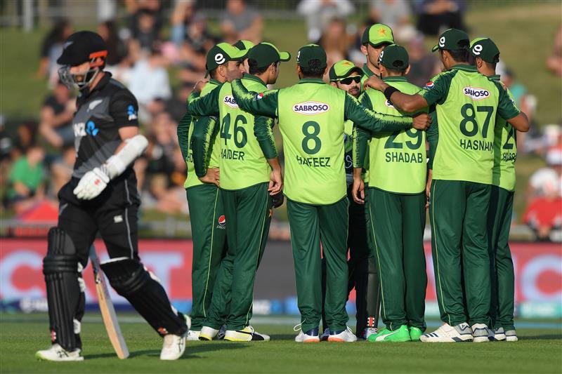 NAPIER, NEW ZEALAND - DECEMBER 22: Pakistan players celebrate the wicket of Kane Williamson during the third game of the International T20 series between New Zealand and Pakistan at McLean Park on December 22, 2020 in Napier, New Zealand. (Photo by Kerry Marshall/Getty Images)