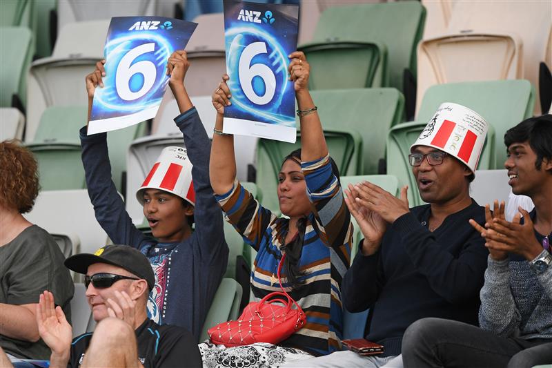 NAPIER, NEW ZEALAND - DECEMBER 22: Fans celebrate a six during the third game of the International T20 series between New Zealand and Pakistan at McLean Park on December 22, 2020 in Napier, New Zealand. (Photo by Kerry Marshall/Getty Images)