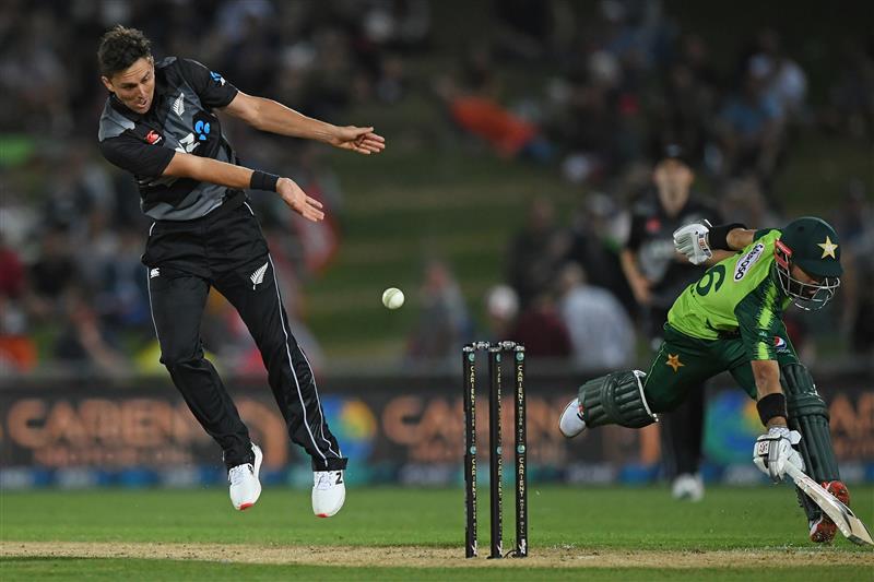 NAPIER, NEW ZEALAND - DECEMBER 22: Trent Boult of New Zealand attempts a runout during the third game of the International T20 series between New Zealand and Pakistan at McLean Park on December 22, 2020 in Napier, New Zealand. (Photo by Kerry Marshall/Getty Images)