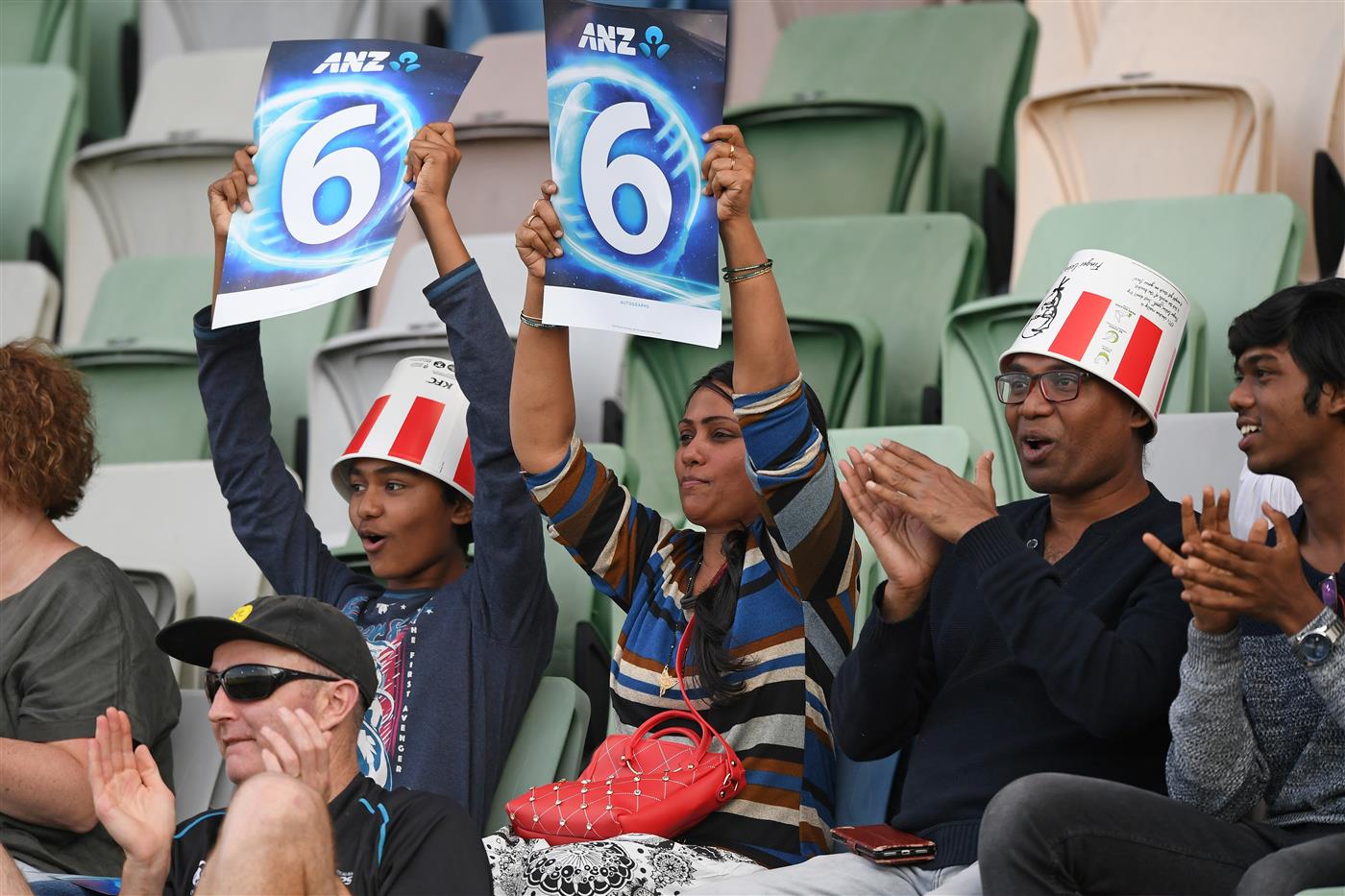 NAPIER, NEW ZEALAND - DECEMBER 22: Fans celebrate a six during the third game of the International T20 series between New Zealand and Pakistan at McLean Park on December 22, 2020 in Napier, New Zealand. (Photo by Kerry Marshall/Getty Images)
