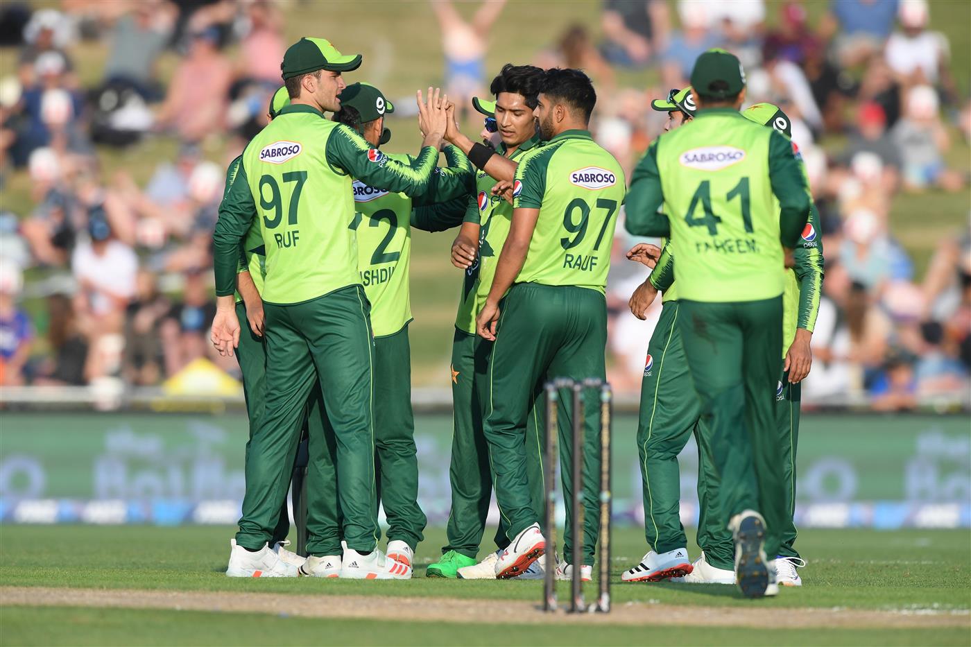 NAPIER, NEW ZEALAND - DECEMBER 22: Pakistan players celebrate a wicket during the third game of the International T20 series between New Zealand and Pakistan at McLean Park on December 22, 2020 in Napier, New Zealand. (Photo by Kerry Marshall/Getty Images)