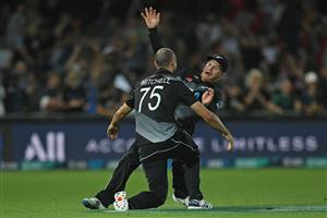 NAPIER, NEW ZEALAND - DECEMBER 22: Daryl Mitchell and Glenn Phillips of New Zealand celebrate a wicket during the third game of the International T20 series between New Zealand and Pakistan at McLean Park on December 22, 2020 in Napier, New Zealand. (Photo by Kerry Marshall/Getty Images)