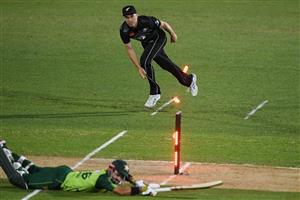 NAPIER, NEW ZEALAND - DECEMBER 22: Todd Astle of New Zealand attempts to runout Mohammad Rizwan of Pakistan during the third game of the International T20 series between New Zealand and Pakistan at McLean Park on December 22, 2020 in Napier, New Zealand. (Photo by Kerry Marshall/Getty Images)