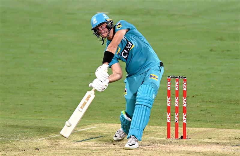 BRISBANE, AUSTRALIA - DECEMBER 30: James Bazley of the Heat plays a shot during the Big Bash League match between the Hobart Hurricanes and Brisbane Heat at The Gabba, on December 30, 2020, in Brisbane, Australia. (Photo by Bradley Kanaris/Getty Images)