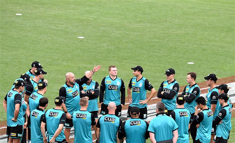 BRISBANE, AUSTRALIA - DECEMBER 30: Coach Darren Lehmann of the Heat speaks to his players before the Big Bash League match between the Hobart Hurricanes and Brisbane Heat at The Gabba, on December 30, 2020, in Brisbane, Australia. (Photo by Bradley Kanaris/Getty Images)