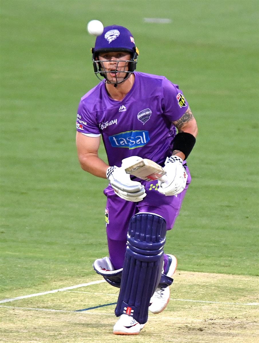 BRISBANE, AUSTRALIA - DECEMBER 30: Ben McDermott of the Hurricanes plays a shot during the Big Bash League match between the Hobart Hurricanes and Brisbane Heat at The Gabba, on December 30, 2020, in Brisbane, Australia. (Photo by Bradley Kanaris/Getty Images)