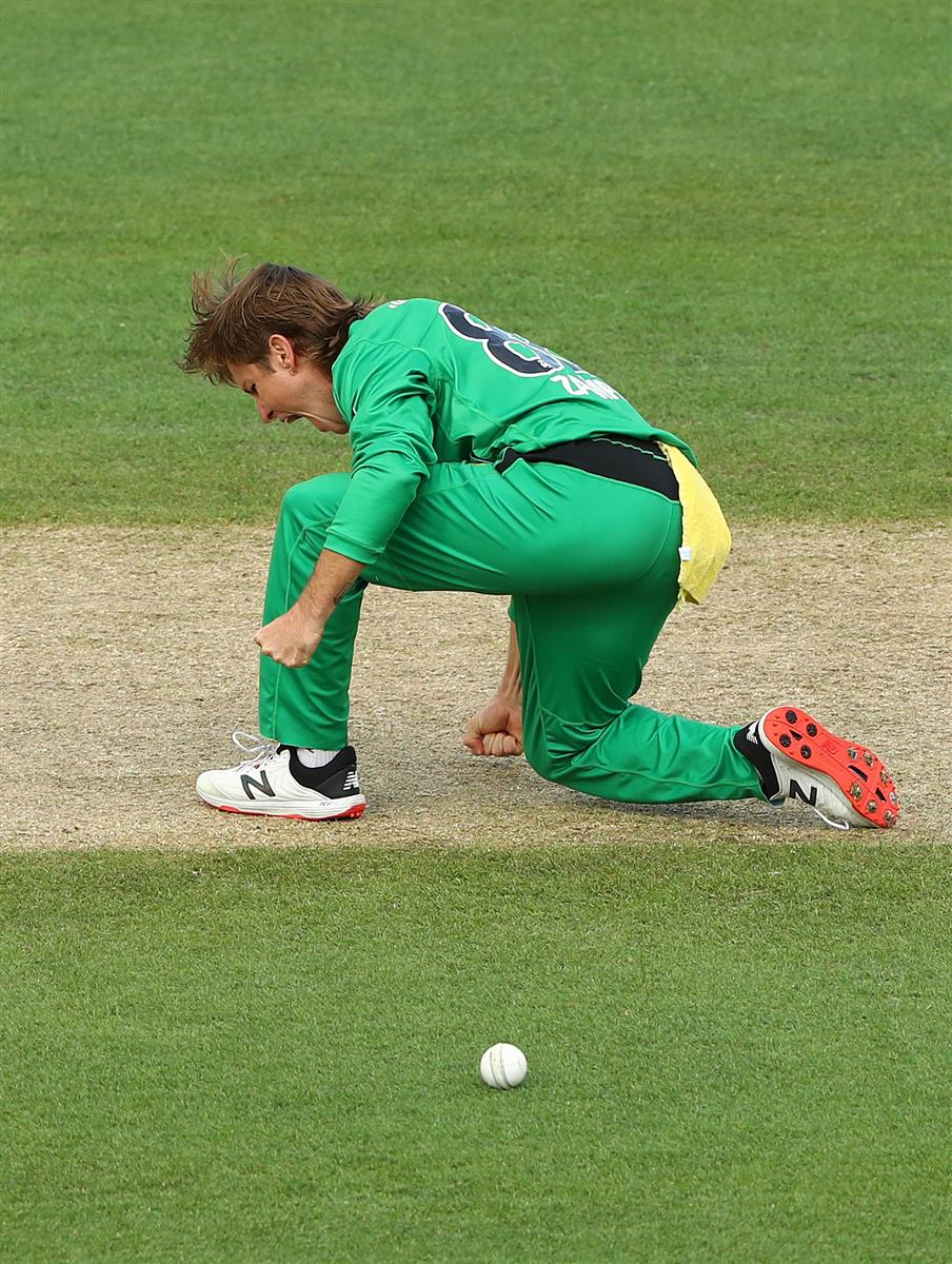 HOBART, AUSTRALIA - JANUARY 04: Adam Zampa of the Melbourne Stars celebrates taking the wicket of Dawid Malan of the Hurricanes during the Big Bash League match between the Melbourne Stars and the Hobart Hurricanes at Blundstone Arena, on January 04, 2021, in Hobart, Australia. (Photo by Robert Cianflone/Getty Images)