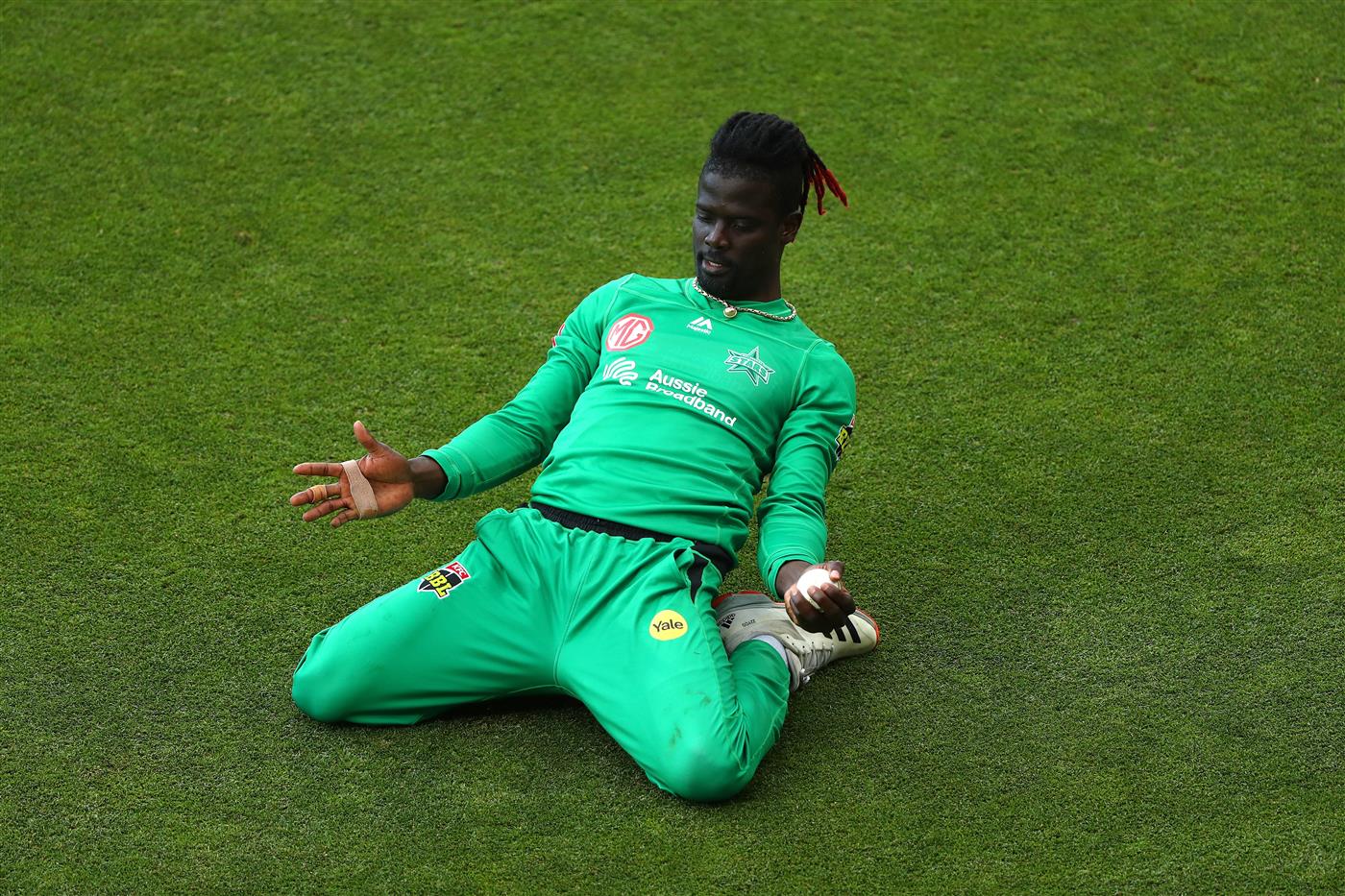 HOBART, AUSTRALIA - JANUARY 04: Andre Fletcher of the Stars celebrates taking a catch to dismiss Ben McDermott of the Hurricanes during the Big Bash League match between the Melbourne Stars and the Hobart Hurricanes at Blundstone Arena, on January 04, 2021, in Hobart, Australia. (Photo by Robert Cianflone/Getty Images)
