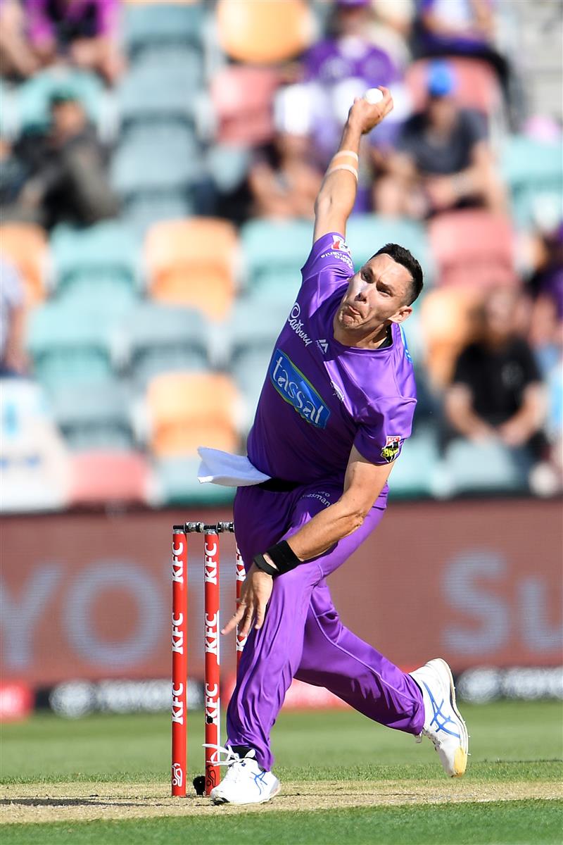 HOBART, AUSTRALIA - JANUARY 04: Scott Boland of the Hurricanes bowls during the Big Bash League match between the Melbourne Stars and the Hobart Hurricanes at Blundstone Arena, on January 04, 2021, in Hobart, Australia. (Photo by Steve Bell/Getty Images)