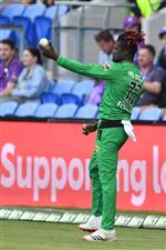 HOBART, AUSTRALIA - JANUARY 04: Andre Fletcher of the Stars celebrates taking a catch to dismiss  Ben McDermott of the Hurricanes during the Big Bash League match between the Melbourne Stars and the Hobart Hurricanes at Blundstone Arena, on January 04, 2021, in Hobart, Australia. (Photo by Steve Bell/Getty Images)