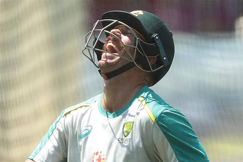 SYDNEY, AUSTRALIA - JANUARY 05: David Warner of Australia laughs on as he bats during an Australian nets session at the Sydney Cricket Ground on January 05, 2021 in Sydney, Australia. (Photo by Mark Metcalfe/Getty Images)