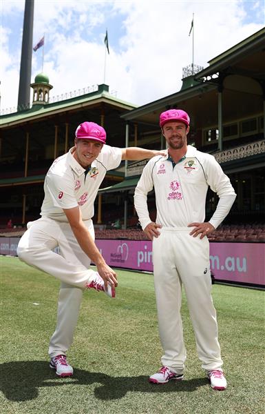 SYDNEY, AUSTRALIA - JANUARY 05: Cameron Green and Travis Head of Australia pose in their Pink Asics Shoes and their McGrath Foundation Pink Cap before an Australian nets session at the Sydney Cricket Ground on January 05, 2021 in Sydney, Australia. (Photo by Ryan Pierse/Getty Images)
