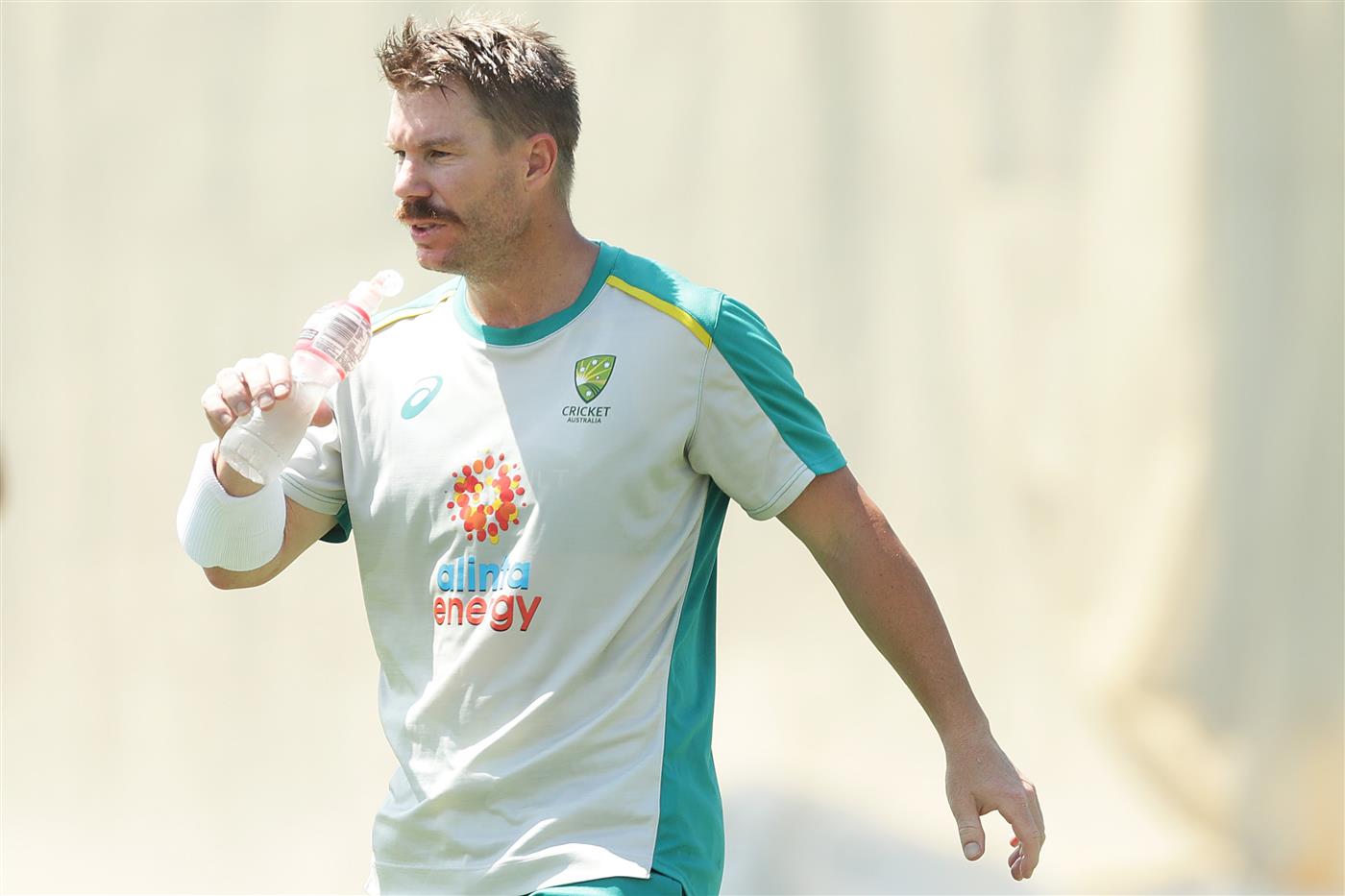 SYDNEY, AUSTRALIA - JANUARY 05: David Warner of Australia drinks during an Australian nets session at the Sydney Cricket Ground on January 05, 2021 in Sydney, Australia. (Photo by Mark Metcalfe/Getty Images)