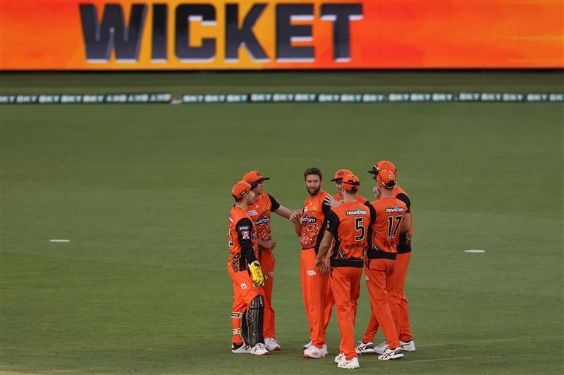 PERTH, AUSTRALIA - JANUARY 06: Andrew Tye of the Scorchers celebrates the wicket of Daniel Hughes of the Sixers during the Big Bash League match between the Perth Scorchers and the Sydney Sixers at Optus Stadium, on January 06, 2021, in Perth, Australia. (Photo by Paul Kane/Getty Images)