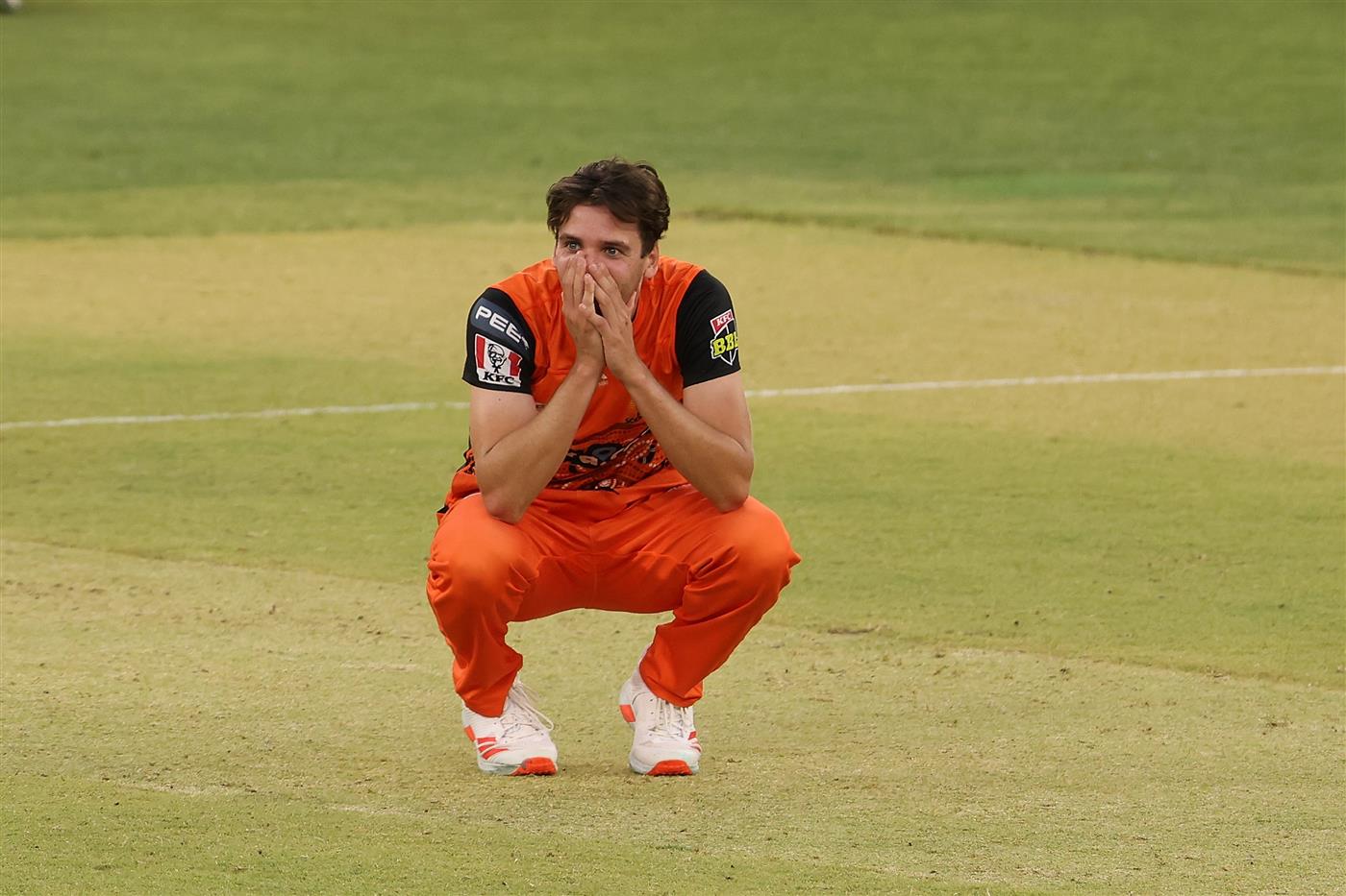 PERTH, AUSTRALIA - JANUARY 06: Jhye Richardson of the Scorchers reacts after a delivery during the Big Bash League match between the Perth Scorchers and the Sydney Sixers at Optus Stadium, on January 06, 2021, in Perth, Australia. (Photo by Paul Kane/Getty Images)