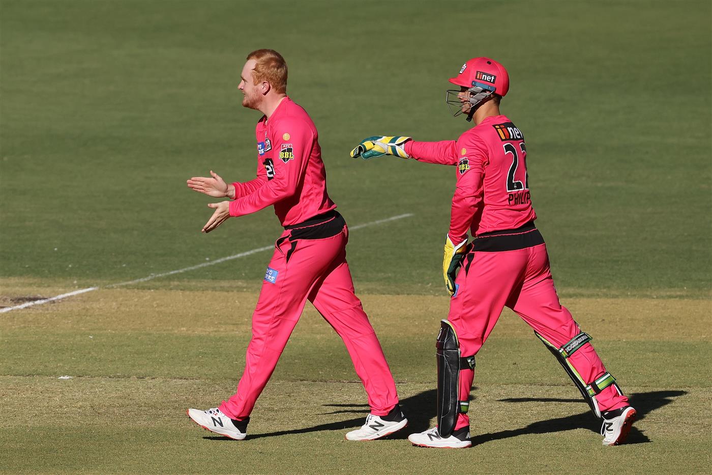 PERTH, AUSTRALIA - JANUARY 06: Lloyd Pope of the Sixers celebrates the wicket of Jason Roy of the Scorchers during the Big Bash League match between the Perth Scorchers and the Sydney Sixers at Optus Stadium, on January 06, 2021, in Perth, Australia. (Photo by Paul Kane/Getty Images)