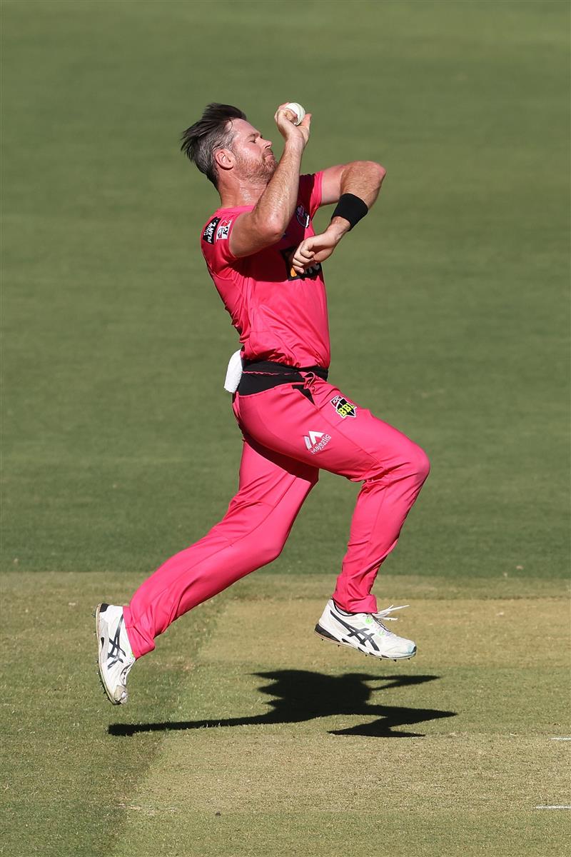 PERTH, AUSTRALIA - JANUARY 06: Daniel Christian of the Sixers bowls during the Big Bash League match between the Perth Scorchers and the Sydney Sixers at Optus Stadium, on January 06, 2021, in Perth, Australia. (Photo by Paul Kane/Getty Images)