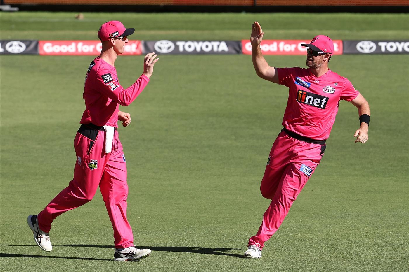 PERTH, AUSTRALIA - JANUARY 06: Jordan Silk of the Sixers and Daniel Christian of the Sixers celebrate the wicket of Liam Livingstone of the Scorchers during the Big Bash League match between the Perth Scorchers and the Sydney Sixers at Optus Stadium, on January 06, 2021, in Perth, Australia. (Photo by Paul Kane/Getty Images)
