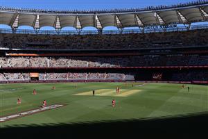 PERTH, AUSTRALIA - JANUARY 06: Sixers players take a knee for the BLM protest as Liam Livingstone and Jason Roy of the Scorchers stand during the Big Bash League match between the Perth Scorchers and the Sydney Sixers at Optus Stadium, on January 06, 2021, in Perth, Australia. (Photo by Paul Kane/Getty Images)
