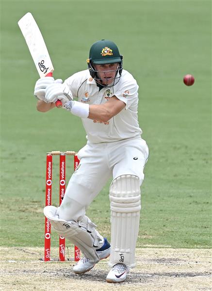 BRISBANE, AUSTRALIA - JANUARY 18: Marnus Labuschagne of Australia plays a shot during day four of the 4th Test Match in the series between Australia and India at The Gabba on January 18, 2021 in Brisbane, Australia. (Photo by Bradley Kanaris/Getty Images)
