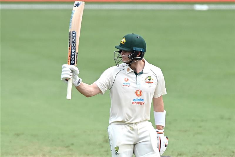 BRISBANE, AUSTRALIA - JANUARY 18: Steve Smith of Australia celebrates after scoring a half century during day four of the 4th Test Match in the series between Australia and India at The Gabba on January 18, 2021 in Brisbane, Australia. (Photo by Bradley Kanaris/Getty Images)