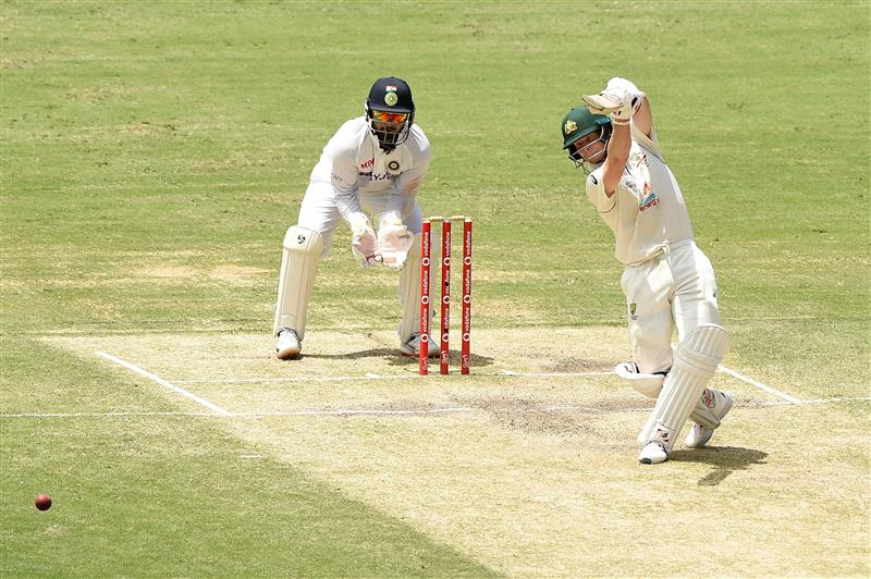 BRISBANE, AUSTRALIA - JANUARY 18: Steve Smith of Australia bats during day four of the 4th Test Match in the series between Australia and India at The Gabba on January 18, 2021 in Brisbane, Australia. (Photo by Matt Roberts/Getty Images)