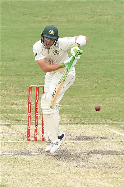 BRISBANE, AUSTRALIA - JANUARY 18: Tim Paine of Australia bats during day four of the 4th Test Match in the series between Australia and India at The Gabba on January 18, 2021 in Brisbane, Australia. (Photo by Matt Roberts/Getty Images)
