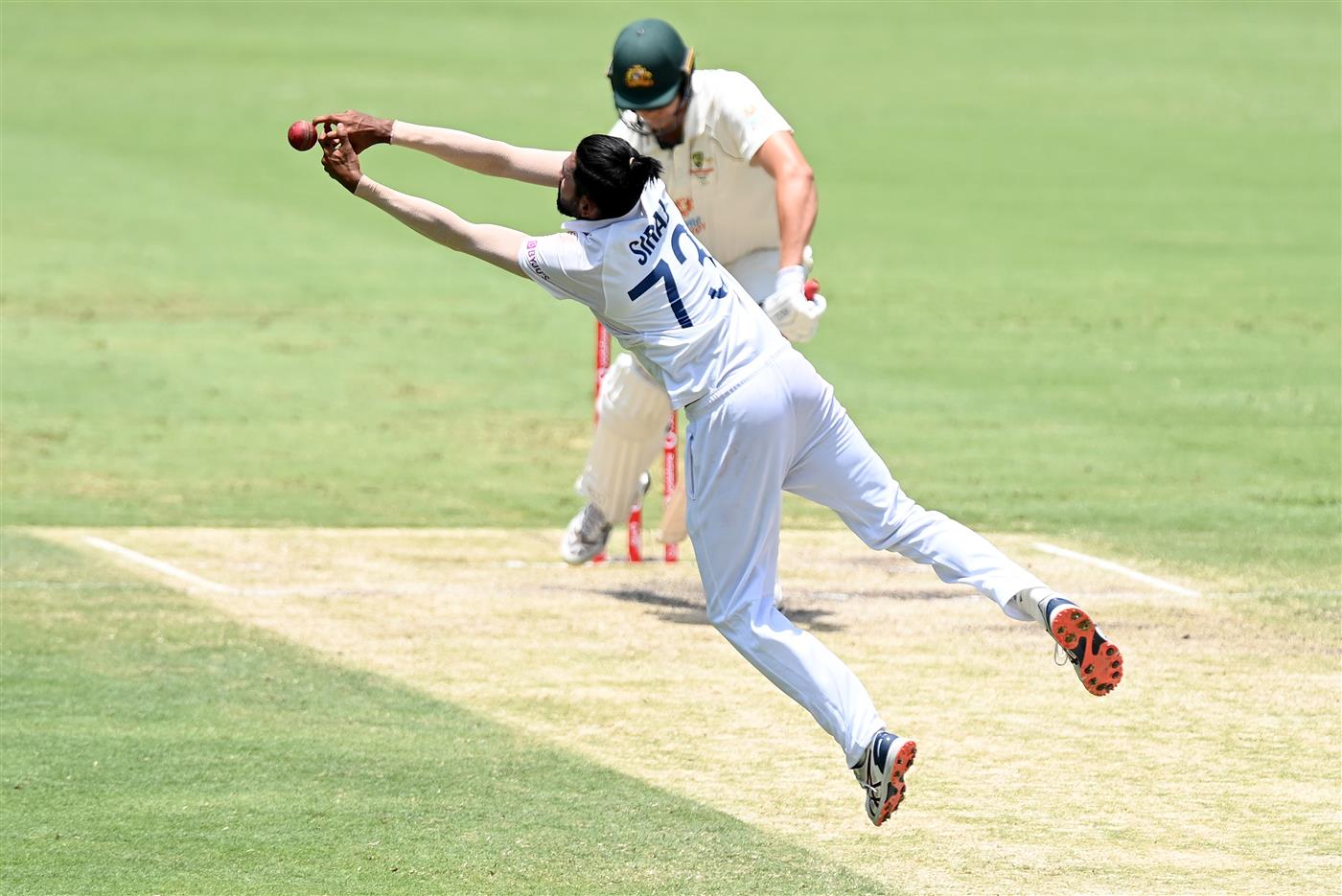BRISBANE, AUSTRALIA - JANUARY 18: Mohammed Siraj of India fields the ball during day four of the 4th Test Match in the series between Australia and India at The Gabba on January 18, 2021 in Brisbane, Australia. (Photo by Bradley Kanaris/Getty Images)