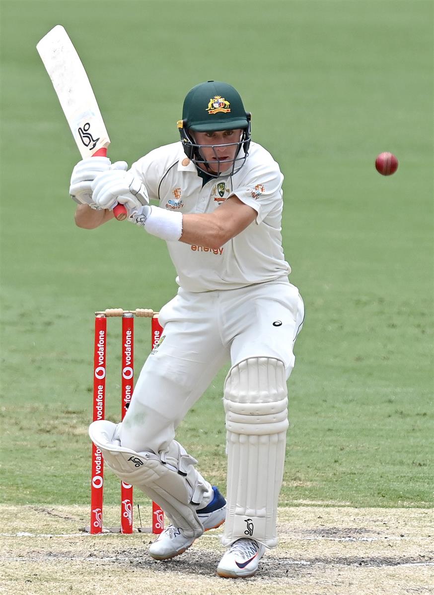 BRISBANE, AUSTRALIA - JANUARY 18: Marnus Labuschagne of Australia plays a shot during day four of the 4th Test Match in the series between Australia and India at The Gabba on January 18, 2021 in Brisbane, Australia. (Photo by Bradley Kanaris/Getty Images)
