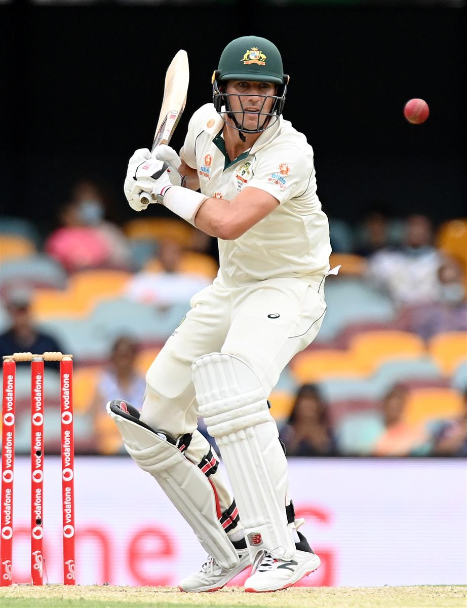 BRISBANE, AUSTRALIA - JANUARY 18: Pat Cummins of Australia bats during day four of the 4th Test Match in the series between Australia and India at The Gabba on January 18, 2021 in Brisbane, Australia. (Photo by Bradley Kanaris/Getty Images)