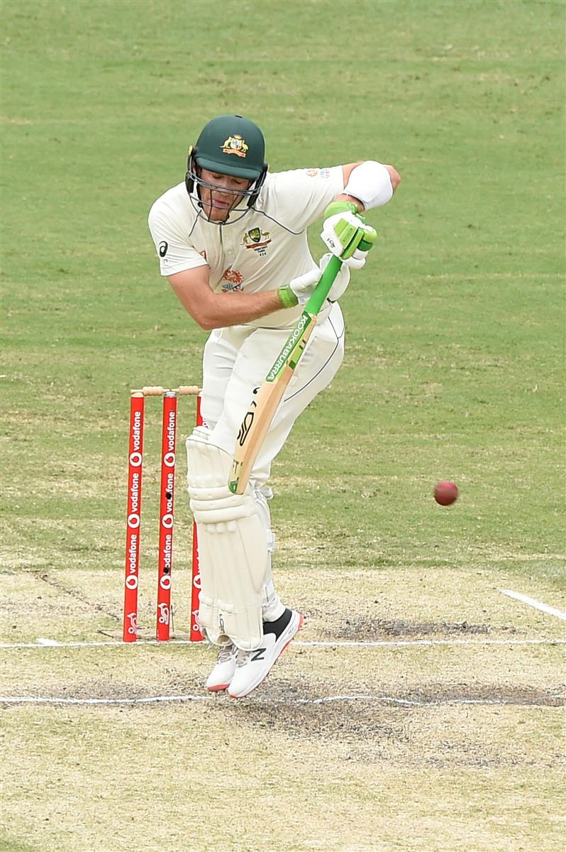 BRISBANE, AUSTRALIA - JANUARY 18: Tim Paine of Australia bats during day four of the 4th Test Match in the series between Australia and India at The Gabba on January 18, 2021 in Brisbane, Australia. (Photo by Matt Roberts/Getty Images)
