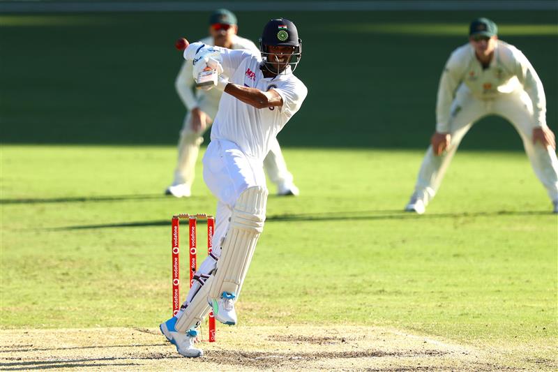 BRISBANE, AUSTRALIA - JANUARY 19: Washington Sundar of India bats during day five of the 4th Test Match in the series between Australia and India at The Gabba on January 19, 2021 in Brisbane, Australia. (Photo by Matt Roberts/Getty Images)
