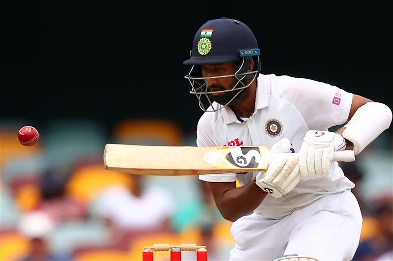 BRISBANE, AUSTRALIA - JANUARY 19: Cheteshwar Pujara of India bats  during day five of the 4th Test Match in the series between Australia and India at The Gabba on January 19, 2021 in Brisbane, Australia. (Photo by Matt Roberts/Getty Images)