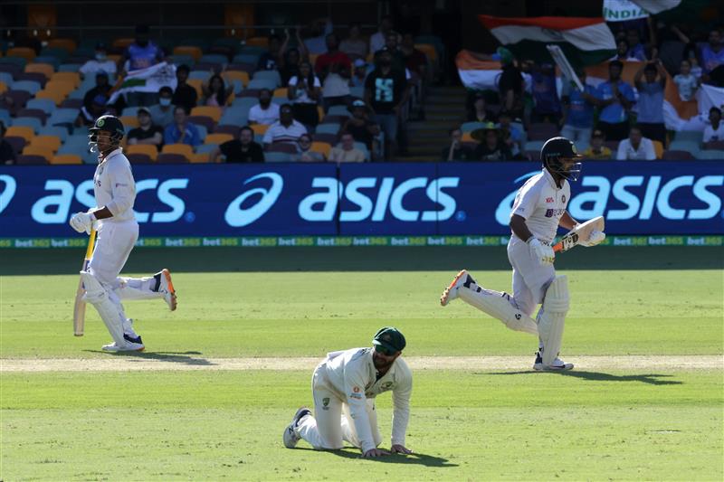 BRISBANE, AUSTRALIA - JANUARY 19: Mayank Agarwal & Rishabh Pant of India bats during day five of the 4th Test Match in the series between Australia and India at The Gabba on January 19, 2021 in Brisbane, Australia. (Photo by Matt Roberts/Getty Images)