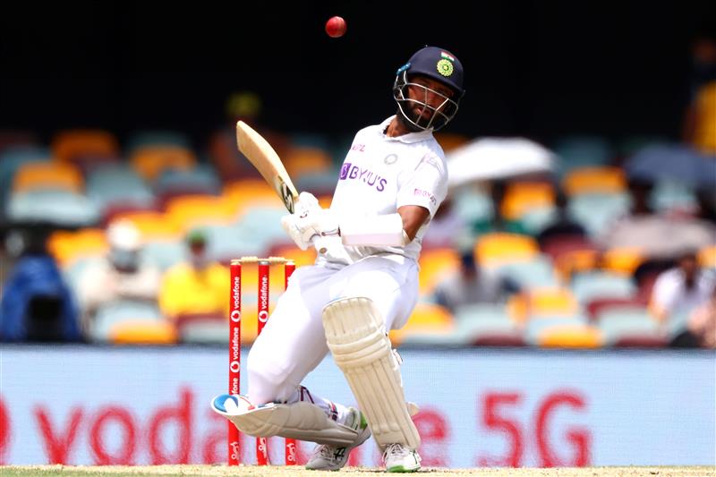 BRISBANE, AUSTRALIA - JANUARY 19: Cheteshwar Pujara of India bats  during day five of the 4th Test Match in the series between Australia and India at The Gabba on January 19, 2021 in Brisbane, Australia. (Photo by Matt Roberts/Getty Images)
