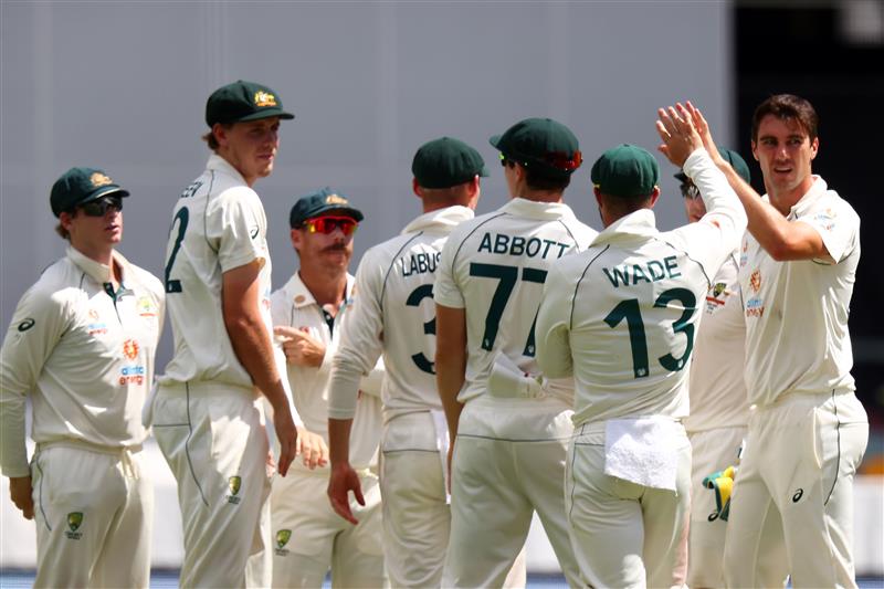 BRISBANE, AUSTRALIA - JANUARY 19: Pat Cummins of Australia celebrates taking the wicket of Ajinkya Rahane of India during day five of the 4th Test Match in the series between Australia and India at The Gabba on January 19, 2021 in Brisbane, Australia. (Getty)