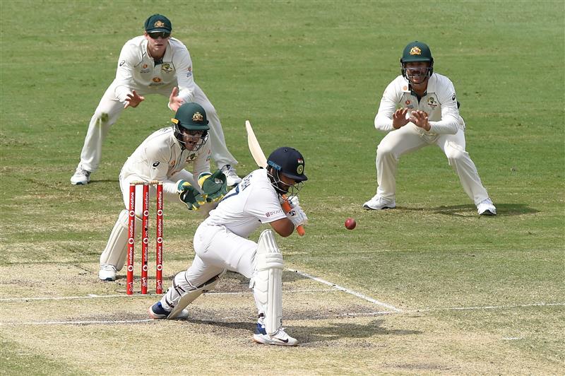 BRISBANE, AUSTRALIA - JANUARY 19: Rishabh Pant of India bats  during day five of the 4th Test Match in the series between Australia and India at The Gabba on January 19, 2021 in Brisbane, Australia. (Photo by Matt Roberts/Getty Images)