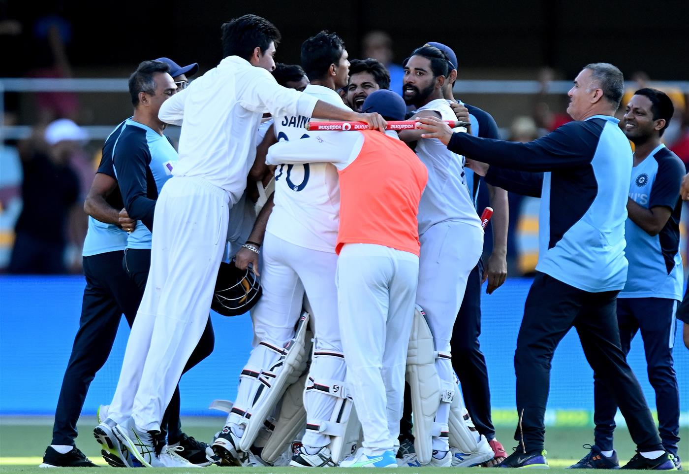 BRISBANE, AUSTRALIA - JANUARY 19: The Indian team celebrates victory after day five of the 4th Test Match in the series between Australia and India at The Gabba on January 19, 2021 in Brisbane, Australia. (Photo by Bradley Kanaris/Getty Images)
