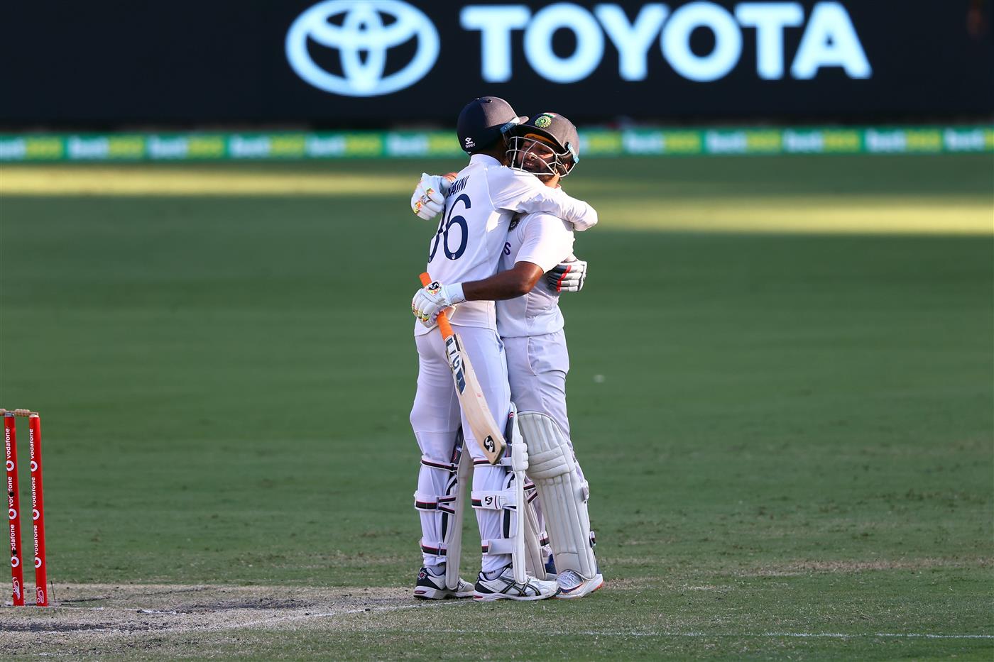 BRISBANE, AUSTRALIA - JANUARY 19: Rishabh Pant and Navdeep Saini of India celebrate victory during day five of the 4th Test Match in the series between Australia and India at The Gabba on January 19, 2021 in Brisbane, Australia. (Photo by Matt Roberts/Getty Images)