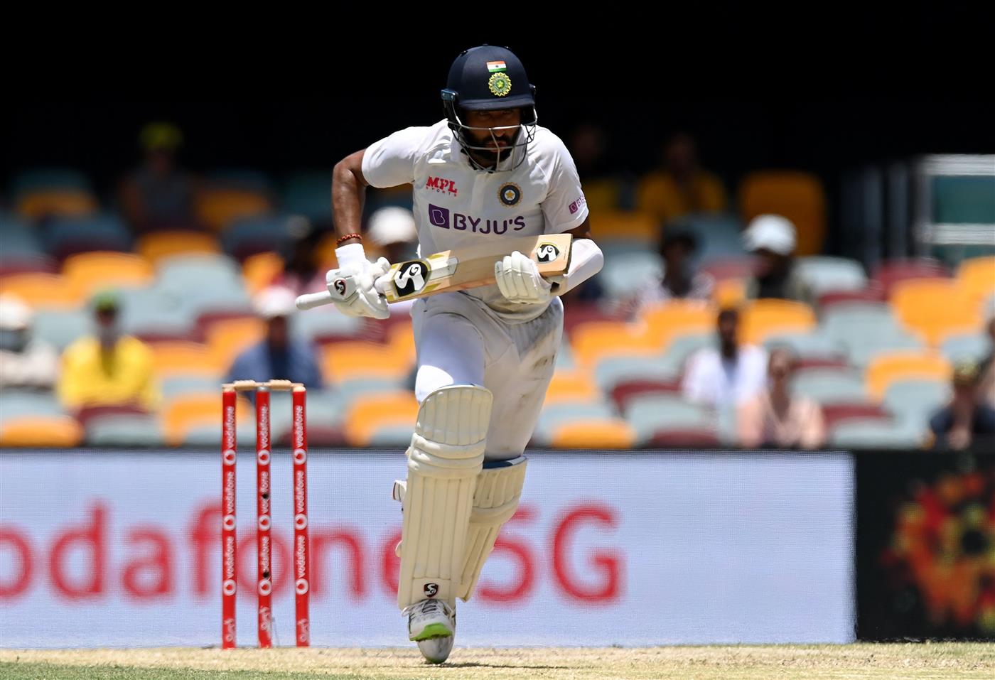 BRISBANE, AUSTRALIA - JANUARY 19: Cheteshwar Pujara of India runs between wickets during day five of the 4th Test Match in the series between Australia and India at The Gabba on January 19, 2021 in Brisbane, Australia. (Photo by Bradley Kanaris/Getty Images)