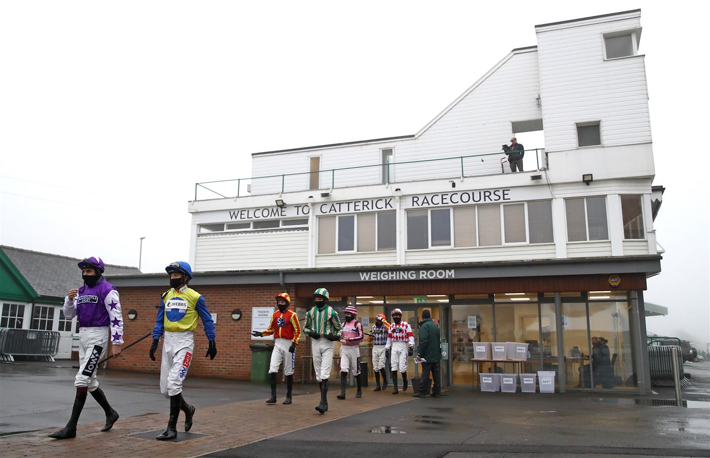 CATTERICK, ENGLAND - FEBRUARY 05: Aidan Coleman and Daryl Jacob lead out the jockeys ahead of the Millbry Hill Juvenile Hurdle race at Catterick Racecourse on February 5, 2021 in Catterick, England. (Photo by Pool/Getty Images)